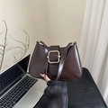 Deep brown glossy shoulder bag featuring a prominent square gold buckle and slim strap - Dark Brown