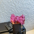 Metallic pink bow acrylic mini bag with mirror finish and delicate silver chain strap - Rose Red