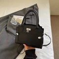 Chic black litchi grain handbag with silver padlock and detachable shoulder strap - Black