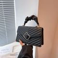 Chic black V-quilted faux leather mini crossbody bag with golden twist lock closure - Black