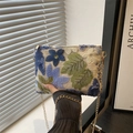 Beige woven envelope clutch bag with blue floral embroidery and sequins on metal chain - Blue