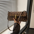 Leopard print baguette shoulder bag with gold metal buckle clasp and fixed strap - Brown