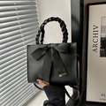 Sac à main noir classique avec grand nœud en satin et poignée tressée de style moderne - Noir