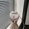 Mini crossbody bag in cream white with cartoon puppy print and decorative bow detail - White