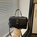 Minimalist black pebble leather crossbody handbag with gold buckle and top handle - Black
