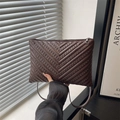 Deep brown V-quilted shoulder bag with metallic rivets and sleek PU leather finish - Brown