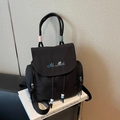 Chic black nylon backpack with Ai Mei embroidery and decorative drawstring beads - Black