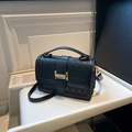 Bolso de mano negro con acolchado geométrico, hebilla H dorada y correa de hombro - Negro