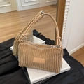Minimalist beige corduroy underarm bag with vintage texture and sleek leather strap - Khaki