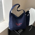 Borsa tote in tela blu scuro con ricamo rosso e tracolla larga per uso quotidiano - Blu scuro