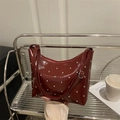 Deep red vintage bucket bag with silver studs and adjustable leather shoulder strap - Red