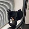 Chic black matte suede crescent underarm bag with scrunchie handle and bow detail - Black