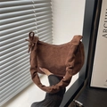 Brown faux suede ruched underarm bag with decorative bow and slouchy vintage design - Brown