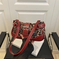 Chic leopard print and red leather underarm bag with oversized metal buckle detail - Leopard Red