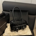 Large black shiny bowling bag with multi-pocket design and glossy patent leather finish - Black