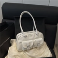 Chic white faux leather underarm pillow bag with double front pockets and silver zippers - White