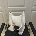 Chic white hobo shoulder bag with silver hardware and adjustable strap for women - White