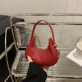 Chic red leather hobo handbag for women with elegant gold hardware and smooth finish - Red
