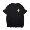 Men's oversized black T-shirt featuring gold emblem print and cotton fabric texture - XL / Black