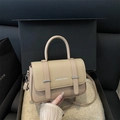 Chic light brown faux leather crossbody bag with textured flap and top handle for women - Khaki