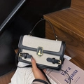 Vintage Umhängetasche in Kontrastfarben mit Canvas, schwarzem Leder und Goldschloss - Schwarz