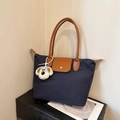 Large dark blue nylon tote bag with brown leather handles and plush dog charm - With Pendant / Navy Blue