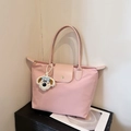 Pink waterproof nylon tote bag with leather handles and a cute plush dog charm - With Pendant / Pink