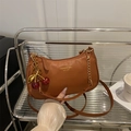 Brown litchi grain leather crossbody bag with chain strap and cherry charm detail - With Pendant / Brown