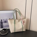 Minimalist beige leather tote bag with green handles and pink floral silk scarf - White Green