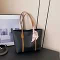 Minimalist black tote bag with brown handles and pink silk scarf in variant display - Black Brown
