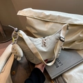 Chic beige crescent dumpling bag with a cute plush charm and adjustable strap - With Pendant / White