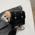 Chic black mini backpack with dual texture panels and cute teddy bear charm detail - With Pendant / Black