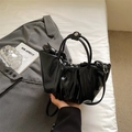 Minimalist black glossy ruched cloud bag with silver hardware and adjustable strap - Black