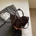 Deep brown ruched cloud bag in glossy patent leather with round top handle and silver strap - Brown
