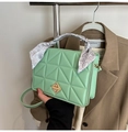 Mint green quilted handbag with golden square lock and silk scarf wrapped handle detail - Green