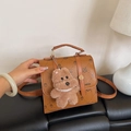 Brown small backpack with LNBOE lettering, owl print and a plush bear charm for women - With Pendant / Brown
