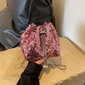 Pink sequin bucket bag with silver chain strap and white pearl drawstring charms - Pink