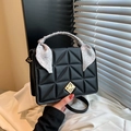 Chic black quilted square crossbody bag with silk scarf handle and gold twist lock - Black
