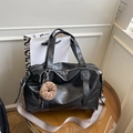 Black large faux leather tote with geometric wide strap and plush donut charm accessory - With Pendant / Black
