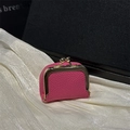 Mini rose pink litchi leather jewelry pouch with gold kiss-lock clasp on white silk - Rose Red