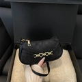 Black baguette bag featuring jacquard 'M' texture and golden heart metal chains - Black