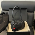 Black pebble leather handbag with red heart charm and dual handles in premium gift box - Black