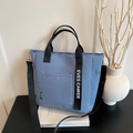 Blauwe canvas lunchtas met verstelbare schouderband en sportieve merkdetails erop - Blauw