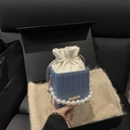 Mini woven bucket bag in blue and white with pearl handle and golden chain strap - Blue
