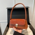 Light brown faux leather shoulder bag with crocodile pattern and gold buckle clasp - Brown