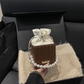 Mini pearl bucket bag in brown woven leather with white drawstring and gold chain - Brown