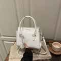 Chic white snake-embossed crossbody bag with top handle and fashion logo lettering - White