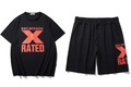 Men's oversized black sports set with t-shirt and shorts featuring orange art print - T-Shirt And Shorts
