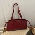Minimalist large tote bag in dark red leather with drawstring detail and silver buckles - Red
