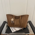 Brown leopard embossed tote bag for women with a plush pompom charm and long handles - With Pendant / Brown